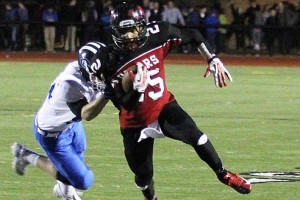 Senior Jamaal Conway-Smith Sheds a tackle against Creighton Prep. He will be attending Wayne State next year off a football scholarship. 