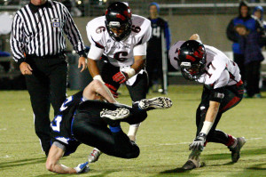 Senior Jalen Cox-Martin dives for a tackle against Papillion-La Vista. Martin will be playing football at Morningside College next year.