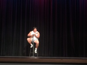 Watanabe on the stage for his Wagon Wheel performance. Photo by Aren Rendell